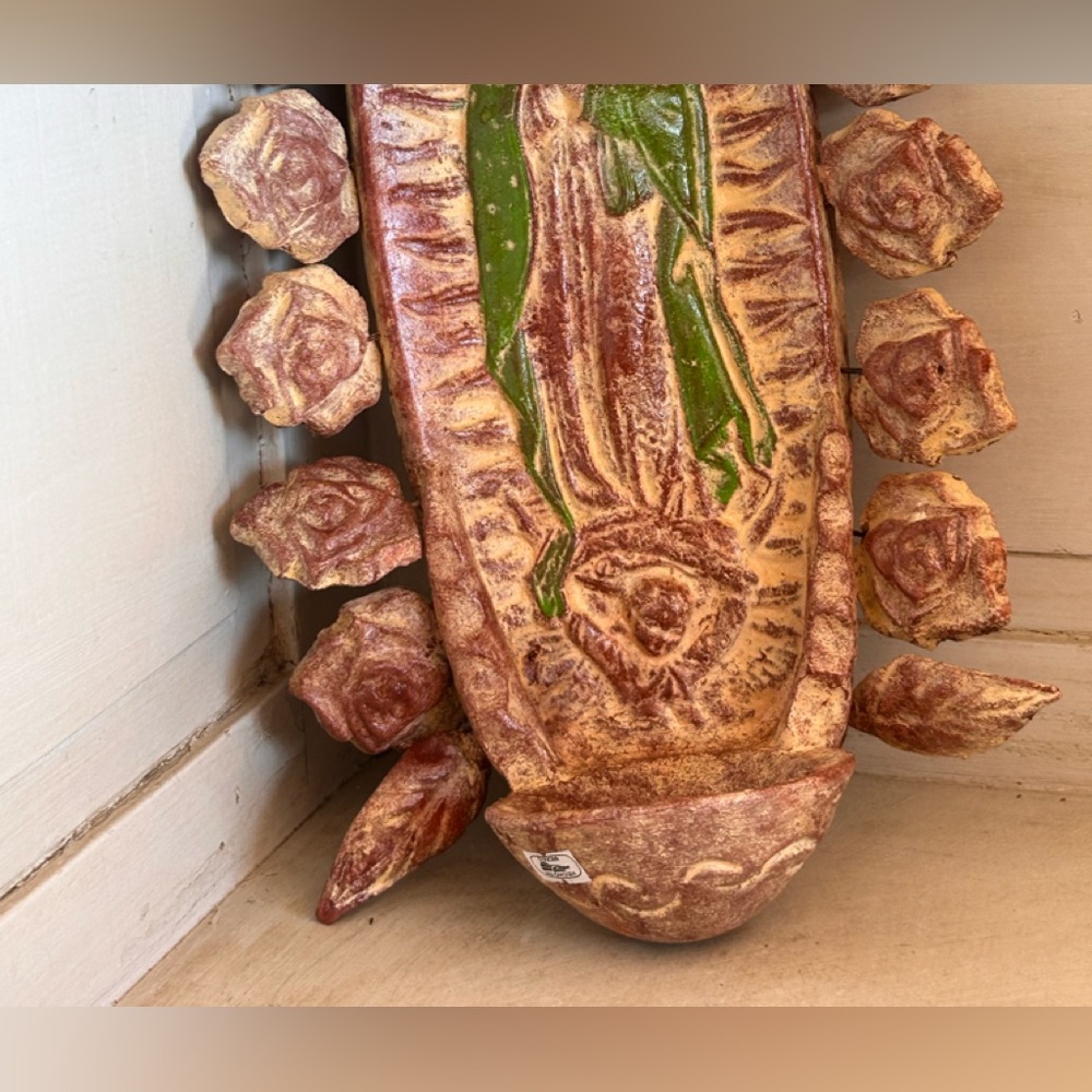 Clay flowers Virgin with holly water dispenser at bottom